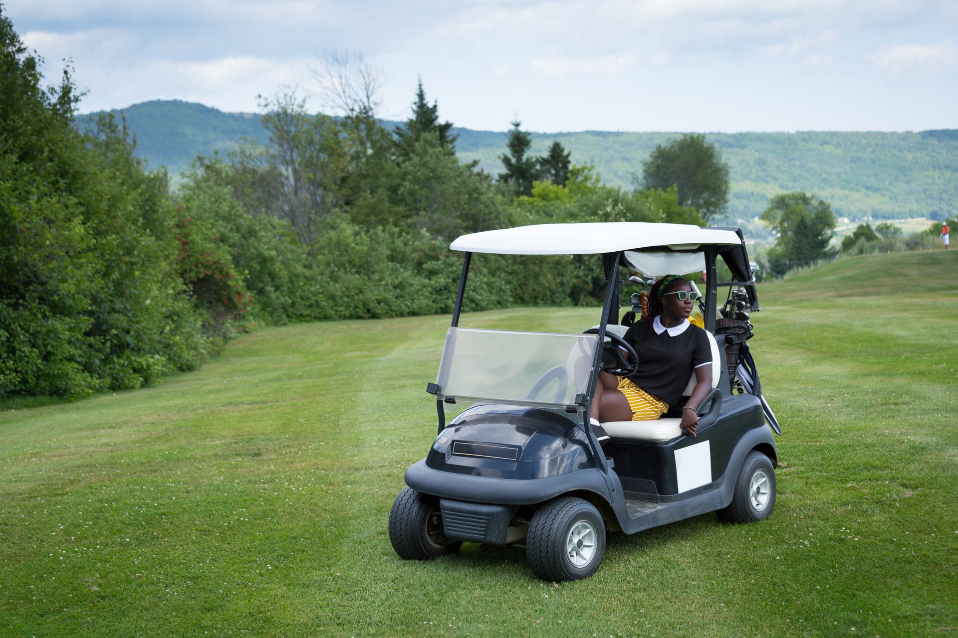 Fashion Teenager Girl in Golf Cart